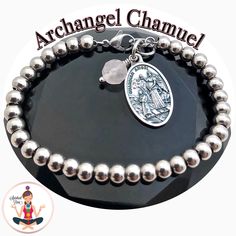 This Spiritual Diva Jewelry Archangel Chamuel Stainless Steel hypoallergenic Rose Quartz healing gemstone charm bracelet adjusts 3 sizes from 6.5 inches to 8 inches. All non Tarnish Stainless Steel hardware, your choice of 1 of 3 charms, and an 8mm faceted Rose Quartz bead charm. Click HERE for a custom order. If you see another charm you like from a different listing send us the link. Each piece of Spiritual Diva Jewelry comes with 2 description cards and a gift bag Archangel Chamuel is the ang Archangel Chamuel, Angel Bracelet, Rose Quartz Healing, Crystal Reiki, Guardian Angels, Rose Quartz Beads, Crystal Rose, Energy Crystals, St Michael