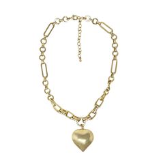 Add a charming touch to your outfit with our Encouraged Mini Bow Necklace! This dainty accessory features a mini bow and pearl, perfect for layering or wearing on its own. Cute and versatile, it's a must-have addition to any jewelry collection. Large Chain Heart Necklace 18k Gold Plated Over Brass 41 + 5 cm long Cubic Zirconium Detailing on Chain Extendable Lobster Clasp Metal Heart Necklace With Chunky Chain, Gold Heart Pendant Chain Necklace, Gold Chain Necklace With Heart Charm, Trendy Gold Heart Necklace With Adjustable Chain, Trendy Heart Shaped Necklace With Gold Chain, Trendy Heart-shaped Gold Chain Necklace, Gold Chunky Heart-shaped Jewelry, Chunky Heart-shaped Gold Jewelry, Chunky Heart-shaped Gold Necklace