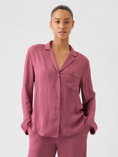 Soft satin pajama shirt.  Notch collar, button front.  Long sleeves.  Patch pocket at chest.  Certain styles have allover prints.  Fit: Over Gap Relaxed Fit Sleepwear For Pajama Party, Long Sleeve Sleepwear With Pockets For Spring, Button-up Shirt With Button Closure For Loungewear, Spring Long Sleeve Sleepwear With Pockets, Relaxed Fit Sleepwear With Pockets For Fall, Pink Button-up Shirt For Loungewear, Gap Collared Shirt For Daytime, Gap Collared Shirt For Daywear, Gap Button-up Blouse For Daywear