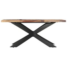 a wooden table with black metal legs and a cross design on the top, against a white background