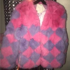 Beautiful And Bold Pink And Purple Diamond Check Jacket Made From The Finest Faux Fur Is A Real Statement Piece. Purple Faux Fur Winter Outerwear, Winter Purple Faux Fur Outerwear, Purple Faux Fur Outerwear For Winter, Winter Purple Faux Fur Coat, Purple Faux Fur Coat For Winter, Purple Faux Fur Trim Coat For Fall, Purple Faux Fur Outerwear For Fall, Purple Long Sleeve Fur Coat With Faux Fur Trim, Purple Fur Coat For Fall