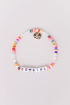 Introducing the "Cowgirl" Bracelet - Unleash Your Inner Wild West Spirit! 🤠🌵 Saddle up and embrace the untamed beauty of the Wild West with our "Cowgirl" Bracelet. This rugged yet chic accessory captures the essence of cowboy culture and the fearless spirit of those who ride free. Part of a Bigger Story: Little Words Project is all about spreading kindness and empowerment through words. Bead Pattern: Crystal Rainbow Be Free Hand-Crafted, Acrylic Beaded Bracelet Plated Brass Hardware Elastic St Western Bracelets Diy, Word Bracelet Ideas, Country Bracelets, Little Words Project Bracelets, Cowgirl Bracelets, Cowboy Culture, Little Words Project, Texas Theme, Western Bracelets