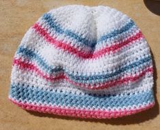 a crocheted hat sitting on top of a table