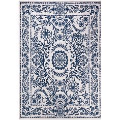 a blue and white rug with an intricate design on the bottom, in front of a white background