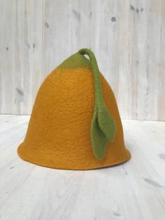 Felted sauna hat from 100% fine merino wool. Handmade.If you have a specially wish, please, contact with me!Sizes: S- 54/55 cm;  M-56/57; L-58/59; XL- 60/62; XXL-62/64Sauna hat protects your head and hair from overheating during sauna sessions. The head is most sensitive to sauna heat – you may feel dizzy, your hair can get excessively dry and brittle, the capillaries in your skin open up and may even break. All of this can make bathing in sauna a less pleasant experience. However, when your hea Adjustable Wool Felt Hat For Fall, Orange Wide Brim Hat For Winter, Orange Short Brim Hat, One Size Fits Most, Orange Brimmed Hat For Fall, Winter Orange Hat With Short Brim, Orange Hat With Short Brim, One Size Fits Most, Handmade Orange Wide Brim Hat, Orange Wide Brim Winter Hat, Handmade Orange Hats With Curved Brim