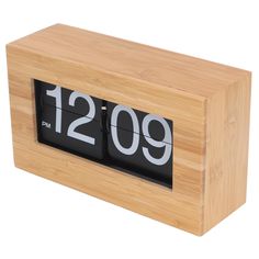 an alarm clock with the time 1209 on it