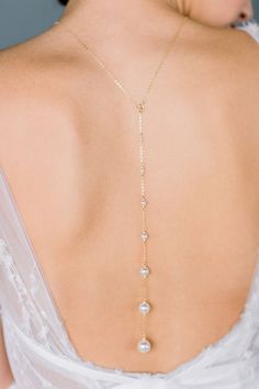 "Our back jewelry are our most popular designs and we just love the simple modern style of our DARCY back necklace. A single beautiful drop of graduated round pearls, ranging from 3mm-12mm (for the longest lengths) that connects at the back with spring ring for a beautiful V drop. The front of this beautiful necklace is a single choker style length with a beaded bar of 3 round pearls accented with seed beads. The perfect simple modern back necklace! To purchase just the necklace - visit this lis Bridal Vibes, Modern Wedding Jewelry, Embellished Veil, Gold Drop Necklace, Bead Inspiration, Back Chain, Drop Jewelry, Shoulder Necklace, Wedding Help