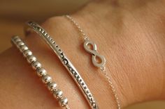 Adjustable sterling silver infinity bracelet. This dainty sterling silver bracelet is fitted with a classic infinity symbol. Classic, high-quality 925 sterling silver at a price you simply won't find elsewhere. Perfect for everyday use and adjustable -- wearable it at either 6.5 or 8 inches. If you have a question, please send a message ... I'm always happy to help! This bracelet was handcrafted with love in Los Angeles, California. Adjustable Silver Bracelet, Silver Infinity Bracelets, Everyday Bracelet, Infinity Symbol, Sterling Silver Bracelet, Chain Link Bracelet, Los Angeles California, Infinity Bracelet, Sterling Silver Bracelets