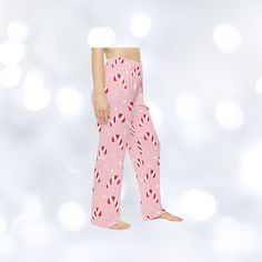 Get cozy and festive with these Candy cane Christmas pajama pants, perfect for lounging around during the holiday season. The soft fabric and elastic waistband provide comfort while the Christmas design adds a touch of cheer to your sleepwear. Ideal for women looking for a cozy and festive option for the holiday season. Product features - 100% Polyester fabric for durability and quick drying - Size and care label inside waistband for convenience - Soft hand-feel and smooth printing canvas - 100% brushed polyester material for comfort - Assembled in the USA from globally sourced parts Care instructions - Do not dryclean - Do not iron - Tumble dry: low heat - Do not bleach - Machine wash: cold (max 30C or 90F) White Sleepwear, Christmas Pajama Pants, Xmas Gifts For Her, Pj Bottoms, Candy Cane Christmas, Womens Pajamas Pants, Pajama Robe, Christmas Candy Cane, Christmas Pajamas