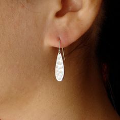 "These sterling silver teardrops dangle from sterling silver ear wires for a beautifully simple look.  ROSE GOLD VERSION: https://www.etsy.com/listing/561692201 (see photos above) Perfect for everyday. Silver Teardrop measures 20x5mm or 1/4 x 3/4\" and total length of  earrings or 1\" from the top of the ear wire to the bottom of the teardrop. Your item comes wonderfully boxed and wrapped so you can give it as a gift - or enjoy opening it as a gift yourself! MATCHING SILVER TEARDROP NECKLACE --- Teardrop Earrings Wedding, Silver Earrings Wedding, Teardrop Bridal Earrings, Silver Bridesmaid, Wedding Earring, Bridesmaid Gifts Jewelry, Teardrop Dangle Earrings, Bridesmaid Jewelry Sets, Teardrop Necklace