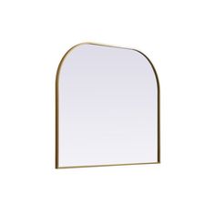 an arch shaped mirror on a white wall with a gold frame and metal trim around the edges