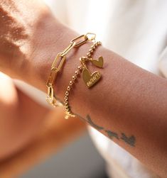 Gold Name Bracelet With Hearts – Rellery Gold Heart Bracelet With Heart Charm For Promise, Gold Heart-shaped Name Bracelet For Everyday, Gold Heart Name Bracelet With Heart Beads, Gold Heart Beads Name Bracelet, Gold Promise Bracelets With Heart Charm, Gold Promise Bracelet With Heart Charm, Gold Name Bracelet With Heart Beads, Everyday Gold Heart Name Bracelet, Gold Heart Bracelet With Charms For Friendship