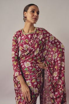 Maroon pre-draped saree with all over gardenia blossom print and hand embroidered detailing. Paired with a matching printed three fourth sleeves blouse. - Aza Fashions Transitional Pre-draped Saree With Floral Embroidery, Traditional Pre-draped Saree With Floral Print, Traditional Pre-draped Saree With Floral Print For Eid, Traditional Art Silk Pre-draped Saree With Floral Print, Traditional Floral Pre-draped Saree For Eid, Festive Pre-draped Saree With Floral Print And Traditional Drape, Festive Pre-draped Saree With Floral Print, Festive Floral Print Pre-draped Saree, Bollywood Pre-draped Saree With Floral Embroidery For Diwali