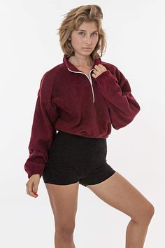 Introducing the Polar Fleece Half Zip. This unisex pullover features elastic hems around the middle of the waist and at the wrists and this style can be worn zipped up or down. Casual and functional with a generous fit to the body and arms. Perfect for layering over our crop tops and bike shorts. This product is made in South Central, Los Angeles. Our experienced seamstresses earn an average up to $20 an hour or more and no less than $15. Plus benefits and overtime. Winter Stretch Sweatshirt For Leisure, Winter Stretch Tops For Leisure, Cozy Fleece Sweatshirt With Ribbed Waistband, Cozy Fit Sweatshirt With Ribbed Waistband, Leisure Fleece Top With Ribbed Cuffs, Fall Fleece Tops With Ribbed Waistband, Sporty Half-zip Sweater With Ribbed Cuffs, Fall Long Sleeve Sweats With Elastic Waistband, Casual Winter Tops With Elastic Cuffs