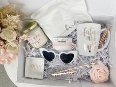 a white box with pink flowers and personalized items