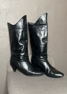 Vintage late 1970's Leather boots from Cobbies size 8.5 women's. Soft Black genuine leather. Pull on style hits at mid-calf. Almond toe and cone shaped low 2.5" heel. Angled edge at top curves down at sides with a slightly higher dip at the front. Looks fantastic scrunched down, folded over, or pulled straight up. In great condition, obvious wear on soles but no major flaws. Leather and Lining look fantastic! Freshly cleaned and polished, these boots are ready for their new home. Measurements ta Pointed Heels, Ladies Shoes, Black Leather Boots, Soft Black, Boot Shoes Women, Mid Calf, Leather Boots, New Home, Womens Boots