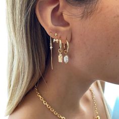 A mix between edge and elegance, the Juli Earring Set is a 5-piece favorite! Featuring a unique assortment of styles with pretty pearl adornments this set makes for a true ear party. Layered Earrings Ear Piercings, Mixing Metals Earrings, Gold And Silver Earring Stack, Three Piercing Stack, Beachy Earring Stack, Gold Earring Stack Ideas, Gold And Silver Earrings Mixing, Gold Earrings Stack, Silver Earring Stack