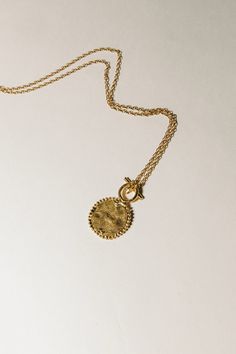 Luxury Vintage Medallion Pendant Necklace, Gold-tone Brass Necklace With Detachable Pendant, Spiritual Yellow Gold-plated Necklaces, Spiritual Yellow Gold Plated Necklaces, 14k Gold Medallion Amulet Jewelry, Yellow Gold Plated Spiritual Necklace, Recycled Gold Medallion Coin Pendant, Brass Coin Pendant Jewelry, Tarnish Resistant Brass Medallion Jewelry