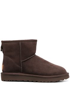 chocolate brown shearling/suede Classic Mini II ankle boots from UGG featuring seam detailing, round toe, logo patch to the rear and ridged rubber sole. | UGG Classic Mini II ankle boots Chocolate Uggs Outfit, Chocolate Uggs, Chocolate Ugg Boots, Uggs Mini, Ugg Mini Boots, Brown Uggs, Ugg Ankle Boots, Ugg Classic Mini Ii, Ugg Booties