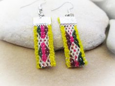 One pair of yellow textile earrings. These lightweight, colorful woven fabric earrings are made from indigenous Bolivian aguayo fabric hand-woven on a loom. These ethnic-style earrings have hypoallergenic surgical steel ear wires and hang 2 inches long, including the hook.  You'll love these dangle earrings for yourself or as a gift for a friend. For example, they might be a fun gift for your sister, teen or best friend. They are different colors on each side, enabling you to wear them with a wi Textile Earrings, Gifts For Your Sister, Fabric Earrings, Crimp Beads, Ethnic Earrings, Unique Earrings, Woven Fabric, Earrings Handmade, Jewelry Pieces