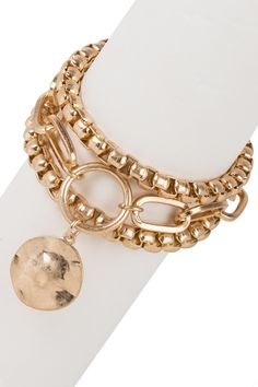 Layering various gold chains with a circular charm, this vintage-inspired bracelet makes a stunning yet eclectic statement for any occasion. With our Selma Bracelet, you'll feel like you've struck gold Materials: Iron, Zinc Lobster Clasp Gold Layered Bracelets, Layered Bracelets, Curator Style, Gold Material, Bracelet Making, Vintage Gold, Gold Chains, Lobster Clasp, Vintage Inspired