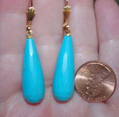 Quality 14k gf 45mm large chinese turquoise tear drop 25ctw lever back earrings vintage gorgeous large pair of 14k gold filled quality sleeping beauty color chinese carved turquoise lever back earrings a+ quality diameter of tear drops: 11 mm in widest area from top to bottom 48 mm you are buying from a multi listing. every pair is a bit different based on the nature of turquoise. if you need a photos of the exact pair, plesae let me know and i will send you additionsl photos. gorgeous coloring Tear Drops, Leverback Earrings, Sleeping Beauty Turquoise, Earrings Vintage, Earrings Photo, Tear Drop, Vintage Earrings, Jewelry Earrings Dangle, Sleeping Beauty