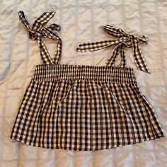 Cropped Plaid Strap With Bows Top Trendy Plaid Tops For Vacation, Chic Plaid Tops For The Beach, Chic Plaid Tops For Beach, Black Cotton Top With Tie Straps, Black Cotton Tops With Tie Straps, Casual Crop Top With Tie Straps For Vacation, Black Tops With Tie Straps For Beach, Black Tie Strap Tops For Beach, Textiles Clothing