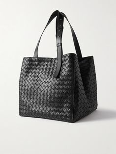 Bottega Veneta's heirloom-worthy tote bag has been crafted in Italy from strips of supple leather in the label's signature intrecciato weave. It's roomy enough to carry your essentials, making it a smart choice for long commutes. Classic Woven Leather Tote Bag, Square Leather Bag With Intrecciato Weave, Classic Tote Bag With Intrecciato Weave, Leather Square Bag With Intrecciato Weave, Elegant Large Shoulder Bag With Leather Handles, Formal Intrecciato Weave Tote Bag, Luxury Woven Calf Leather Bag, Business Tote Shoulder Bag With Intrecciato Weave, Business Intrecciato Weave Tote Shoulder Bag