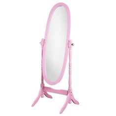 a pink vanity mirror sitting on top of a wooden stand