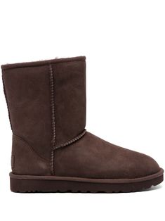 coffee brown calf suede logo patch to the rear round toe slip-on style shearling lining flat rubber sole Ugg Classic Mini Ii Brown, Classic Winter Boots With Suede Lining, Classic Slip-on Winter Boots, Classic Boots With Sheepskin And Suede Lining, Classic Sheepskin Boots With Suede Lining, Brown Shearling Boots With Rubber Sole, Brown Shearling Boots With Leather Sole, Classic Shearling Boots With Round Toe, Brown Shearling Boots With Suede Lining