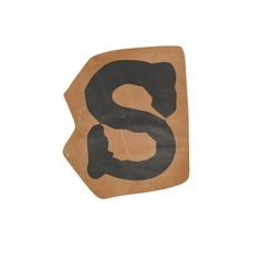 the letter s is made out of cardboard and has black paint on it's side