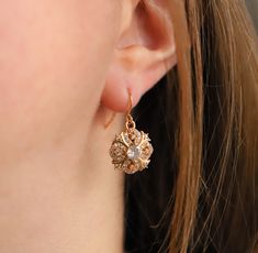 Beautifully sparkly 18k gold plated dangle and drop earrings in a Regency / Victorian style with perfectly shaped round faceted cubic zirconia stones. The drops measure 1.5cm (0.6") in length. Perfect wear for any occasion or to give as a special, thoughtful gift. Your earrings will arrive to you in gift box ready to give or to treat yourself. These earrings are perfect for a bride or bridesmaids for a classic or vintage themed wedding. If you would like a larger quantity, please DM us or email Gold Drop Diamond Earrings For Gift, Gold Crystal Earrings With Sparkling Stones For Gift, Gold Pierced Cluster Drop Earrings, Gold Cluster Earrings With Ear Wire For Anniversary, Gold Diamond Earrings With Ear Wire For Gift, Gold Teardrop Cluster Earrings, Gold Dangle Earrings With Sparkling Stones, Gold Diamond Earrings With Lever Back For Gifts, Gold Diamond Earrings As A Gift