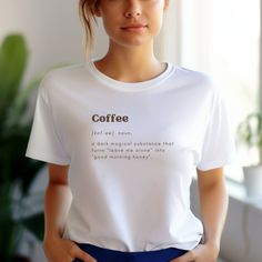 Coffee Addict T-Shirt Funny Definition Shirt Gift Idea for Coffee Lover Tshirt Unisex Comfort Shirt Graphic T-shirt  T-SHIRT: The unisex heavy cotton tee is the basic staple of any wardrobe. It is the foundation upon which casual fashion grows. The shoulders have tape for improved durability. Consisting of 100% cotton for year-round comfort that is sustainable and highly durable.  The classic fit of this shirt ensures a comfy, relaxed wear while the crew neckline adds that neat, timeless look th Coffee Colored Relaxed Fit T-shirt With Slogan, Coffee Color Crew Neck T-shirt For Everyday, Casual Coffee-colored Screen Print T-shirt, Coffee Color Short Sleeve T-shirt With Screen Print, Casual Coffee Crew Neck T-shirt, Coffee Color Relaxed Fit Short Sleeve T-shirt, Casual Coffee Slogan T-shirt, Coffee Graphic Tee With Crew Neck, Casual Coffee T-shirt With Letter Print