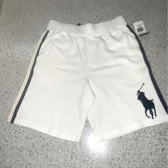 Brand New White/ Dark Blue Trim Drawstring Inside Two Sided Pockets Elastic Waste Band 10-12 (M) White Cotton Playwear Shorts, White Cotton Bottoms For Playwear, White Shorts For Playwear In Spring, White Shorts For Spring Playwear, White Playwear Shorts, White Summer Playwear Shorts, Dark Blue Trim, Polo Tshirts, Boys Cargo Shorts