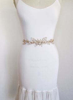 "This delicate romantic belt is made with Swarovski crystals twisted into this intricate design. This belt measures about 14\" long and 2 1/2\" wide in the center. It is attached to sheer organza ribbon measuring 3/8\" wide and 150\" long. This belt is available in gold, silver or rose gold finish." Hamilton Wedding, Wedding Belt, Organza Wedding, Crystal Belt, Wedding Sash Belt, Wedding Sash, Rhinestone Belt, Wedding Belts, Bridal Belt