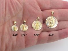 "Fabulous 14k Gold Guadalupe Charm Pendant!! Material: 14k gold , Not plated or filled Metal purity: 14k , Stamped This charm comes in 4 different sizes from right to left: #1: 3/8\" wide in diameter, Baby size #2: 1/2\" wide in diameter, Little smaller than a dime size #3: 5/8\" wide in diameter, The same size as a dime #4: 3/4\" wide in diameter, Larger than a dime size Weight: #1= 0.6 g , #2= 0.9 g , #3= 1.50 g , #4= 2.40 g Please look at the photos carefully to get a good idea of the size. C 14k Gold Miraculous Medal Jewelry In Gold, 14k Gold Jewelry With Miraculous Medal, Yellow Gold Miraculous Medal Jewelry For Wedding, Wedding Yellow Gold Jewelry With Miraculous Medal, Yellow Gold Round Miraculous Medal Jewelry, Yellow Gold Miraculous Medal Jewelry, Engraved Locket, Lady Of Guadalupe, Baby Size