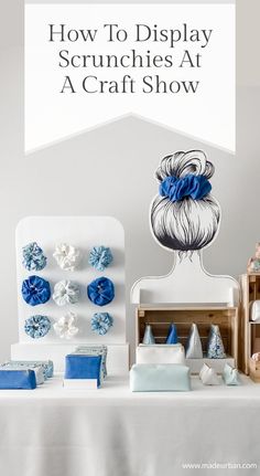 blue and white decorations on a table with the words how to display scrunches at a craft show