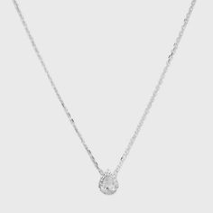 The Sterling Silver Teardrop Cubic Zirconia Halo Station Necklace from A New Day™ is perfect for special occasion wear or gifting. This sterling silver chain necklace features a linked chain with a teardrop pendant with a solitaire cubic zirconia stone surrounded by smaller  stones for a beautiful look. Made from nickel-free metal, this cubic zirconia necklace suits all types of skin, and is easy to wear with the spring ring clasp closure. 

A New Day™: Style that goes wherever you do. Necklaces Sterling Silver, Silver Necklaces For Hoco, Womens Necklaces Silver, Hoco 2024, Sliver Necklace, Fall Ball, Silver Necklace Simple, Types Of Skin, Silver Diamond Necklace