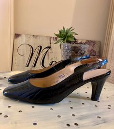 "Vintage 60s Black Leather Croc Effect Sling back/ Kitten heels Size 5/4.5 Brand New old shop stock shoes from the 60s. Leather slip ons/sling backs with a croc effect. The back strap has elastic piece to keep in place. Heel Height 3\" The inner shoe shows style numbers and size I think but are a bit confusing. The bottom of the shoe says 5 though I would say they are a 4.5 unless you have slender feet. I am a 4 and wear a size 4.5 in this shoe. They sit nicely on me but they slip on walking. An Sling Back Kitten Heels, Vintage Shoes Women, Leather Flats Women, Low Heel Flats, Women's Slip Ons, Black Kitten Heels, Flat Dress Shoes, Black Leather Flats, Beautiful Belts