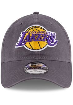 This Los Angeles Lakers Grey Adjustable Hat features a front embroidered team logo on a lightly-structured cotton crown, with pre-curved visor and adjustable backstrap. Team logo embroidered on the front, Cloth Strap Closure to dial in the perfect fit, Relaxed, unstructured fit, Pre-curved bill, 100% cotton construction, New Era Flag logo on side, Dad hat, 100% Cotton, Washable, Imported Team-colored Cotton Hat With Embroidered Logo, Team-colored Cotton Hats With Curved Brim, Cotton Hat With Team Logo For Sports Events, Game Day Cotton Hat With Embroidered Logo, Sports Cotton Hat With Logo, Cotton Sports Hat With Team Logo, Sporty Cotton Hats For Fan Merchandise, Cotton Sports Hat With Logo, Collegiate Cotton Hats For Sports Events