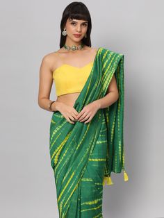 This light weight Green Tie dye saree is a versatile saree that is a must have in your wardrobe. This saree is extremely light weight will give you great pitures and can be worn for different ocassions. Team this saree up with Yellow raw silk blouse & statement earrings. Suitable for Poojas, Day function, brunhes, Wedding & haldi functions. Product Features: Saree Color: Green & yellow Blouse Color: Yellow Saree Fabric: Georgette silk Blouse Fabric: Raw Silk Saree Work: Tie Dye Print Wash Care: Green Zari Work Saree For Summer, Green Saree With Zari Work For Summer, Green Summer Saree With Zari Work, Green Chanderi Pre-draped Saree For Puja, Green Cotton Silk Lehenga With Unstitched Blouse, Green Cotton Lehenga With Dupatta, Green Pre-draped Saree With Unstitched Blouse For Summer, Green Slub Silk Pre-draped Saree For Diwali, Summer Green Pre-draped Saree With Unstitched Blouse