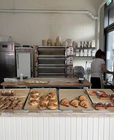 there are many pastries on display in the kitchen