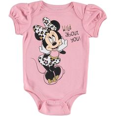 Get ready for some Disney magic when you dress your little one in this adorable Minnie Mouse outfit. This 4-piece set comes with a cute short-sleeve bodysuit featuring artwork of Minnie wearing a floral bow and the words "Adorable As Ever," a pair of leggings with a pretty all-over floral print, a matching floral bib, and a soft floral hat featuring Minnie's 3-D mouse ears and bow. Made from material that is soft on your baby's skin, and with an easy-to-dress design, this Minnie Mouse set will k Minnie Mouse Outfits, Heart Print Dress, Newborn Baby Girls, Pink Newborn, Soft Hats, Newborn Girl Outfits, Layette Set, Floral Hat, Minnie Ears