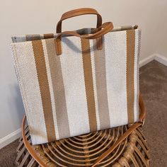 Brand New, Never Used Neutral Striped Tote Bag With Leather Handles And Shoulder Strap. Measure 14”W X 12”H X 6”D Beige Summer Shoulder Bag With Detachable Handle, Casual Light Brown Satchel For Shopping, Beige Double Handle Beach Bag For Everyday Use, Chic Brown Square Canvas Bag, Beige Satchel Beach Bag With Top Carry Handle, Beige Satchel Beach Bag With Detachable Handle, Everyday Beige Satchel Beach Bag, Khaki Shoulder Beach Bag For Everyday Use, Beige Summer Shoulder Bag For Shopping