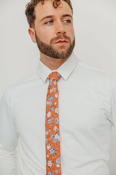 We pride ourselves in offering our customers some of the best skinny ties money can buy. Each DAZI tie is handmade from high quality imported fabrics. Features: Approx. 2.5" wide at the tip Approx. 58" in length 100% Cotton Dapper Cotton Ties For Formal Occasions, Dapper Cotton Tie For Formal Occasions, Dapper Fitted Tie, Dapper Standard Tie, Dapper Fitted Standard Tie, Formal Dapper Cotton Ties, Cotton Ties For Workwear In Spring, Fitted Cotton Suit And Tie Accessories, Formal Cotton Tie