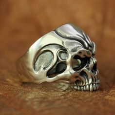 Edgy Silver Skull Ring As Gift, Edgy Silver Skull Ring For Gift, Edgy Silver Rings For Streetwear, Silver Skull Ring For Halloween Streetwear, Silver Edgy Skull Ring, Edgy Skull Ring As A Gift, Edgy Skull Ring For Gift, Adjustable Edgy Skull Ring As Gift, Adjustable Edgy Skull Ring Gift