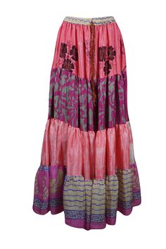 Elevate your wardrobe with the vibrant charm of this flared maxi skirt, skillfully made from upcycled saree fabric. Adorned with rich Rouge Pink and floral patterns alongside bold, eye-catching prints, each silk blends skirt is a unique masterpiece. The adjustable drawstring waist and flowing ankle-length silhouette provide a flattering and comfortable fit, effortlessly combining boho-chic style with everyday practicality. Whether you're wandering through a farmer's market or dancing at a beach Flare Maxi Skirt, Boho Skirts, Silk Skirt, Boho Chic Fashion, Ankle Length, Long Skirt, Pink Floral, Maxi Skirt, Boho Chic