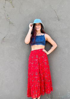 Gorgeous red pleated midi skirt in floral print by CAROLL Paris. The skirt is lined with partly elastic waist, best for L-XL sizes .  Condition: good vintage condition  Size: 44 ( pinned on model) Best fits for L-XL sizes. Label : CAROLL Paris Material: 100% polyester, lining 100% viscose Measurements, taken lying flat : Waist: 42-46 cm/16.5-18'' (partly electric waist) Hips: Free Length: 89 cm/ 35'' For more information please contact me. Red Summer Skirt With Elastic Waistband, Red Skirt With Elastic Waistband For Summer, Red Maxi Skirt With Elastic Waistband, Red Skirt With Elastic Waistband For Spring, Red Tiered Maxi Skirt With Elastic Waistband, Red Midi Skirt With Elastic Waistband, Red Gathered Skirt Bottoms For Summer, Flowy Red Maxi Skirt For Spring, Red Flowy Maxi Skirt For Spring