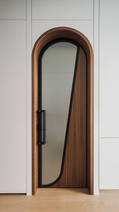 a wooden door with glass on the side