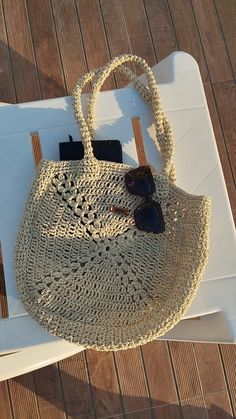 Our Granny bags have a minimalist style.They are crocheted with paper yarn, fully lined with magnet clossings. We make everything ourselves with care for every stitch. Size 40x38 cm handle:68cm Lightweight Cream Crochet Bag For Summer, Lightweight Beige Crochet Shoulder Bag, Lightweight Everyday Jute Bag, Everyday Lightweight Jute Bag, Lightweight Natural Crochet Bag For Daily Use, Everyday Lightweight Crochet Bag In Natural, Summer Crochet Beige Shoulder Bag, Natural Lightweight Crochet Bag For Everyday, Beige Crochet Bag For Daily Summer Use